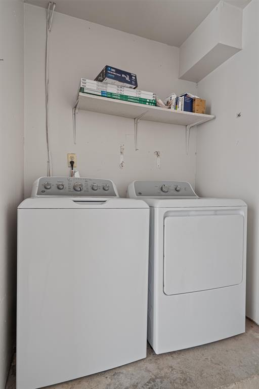 13357 Water Oak Lane, Unit B Austin, TX 78729 - Photo 23 of 26 a utility room with dryer and washer