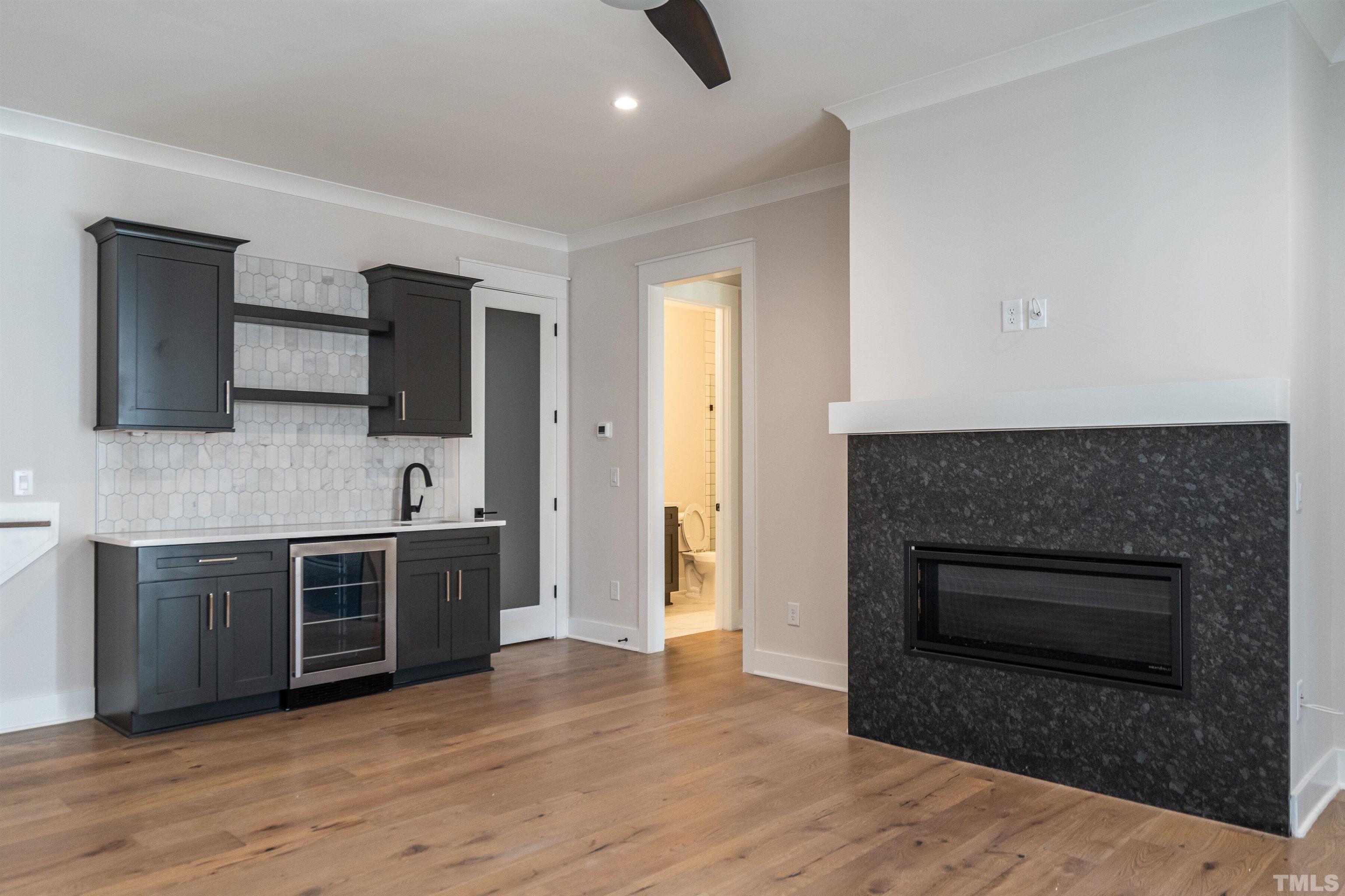 5425 Winding View Lane Raleigh, NC 27615 - Photo 46 of 54 a kitchen with stainless steel appliances a stove top oven a sink and a refrigerator