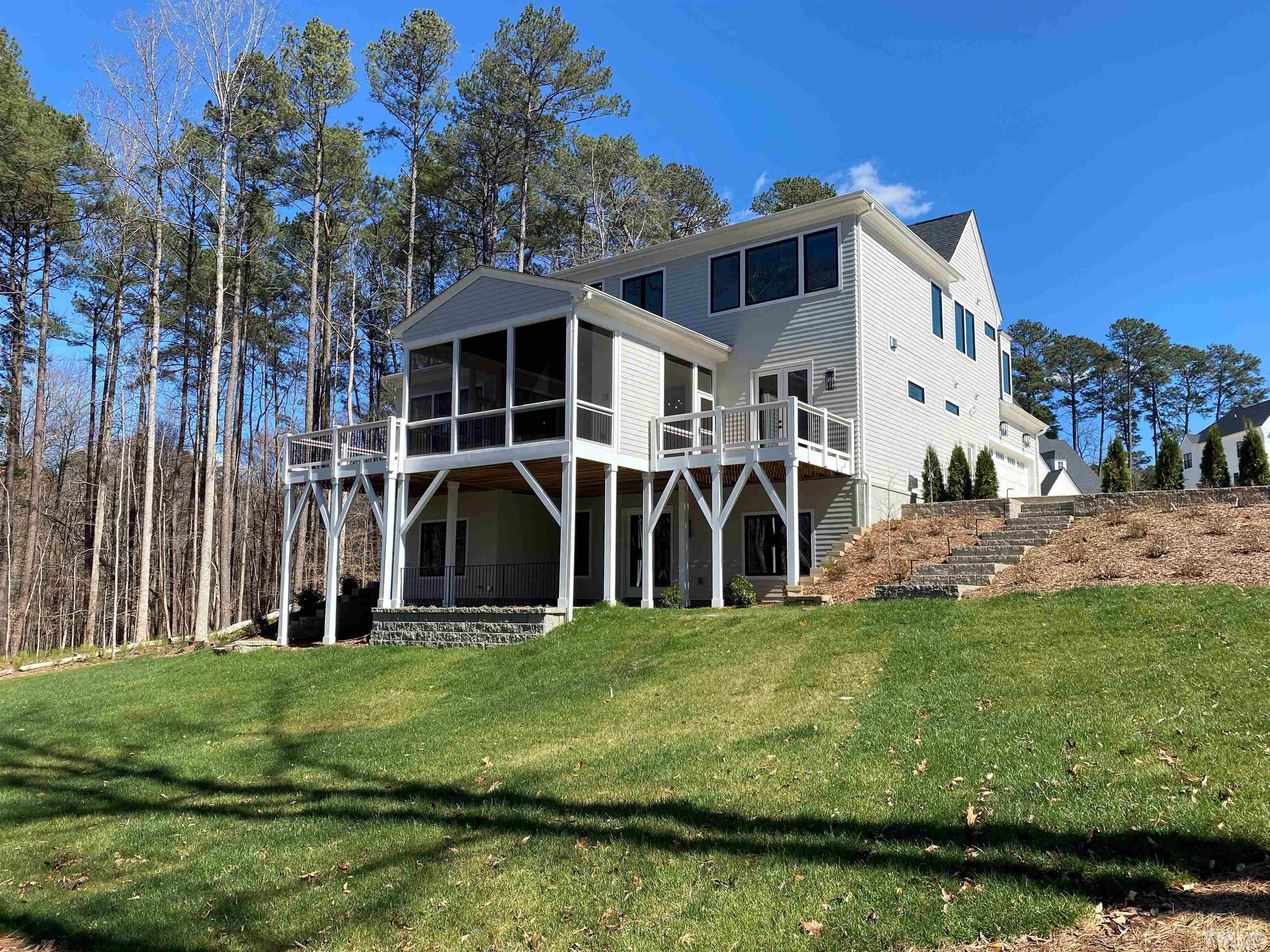 5425 Winding View Lane Raleigh, NC 27615 - Photo 5 of 54 a front view of a house with a yard