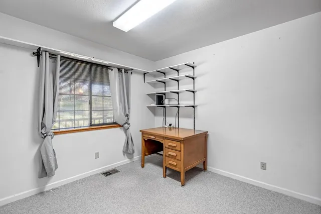a bathroom with a sink and a shower