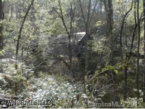 0 Big Pine Road Marshall, NC 28753 - Photo 4 of 9 a view of a city with lush green forest