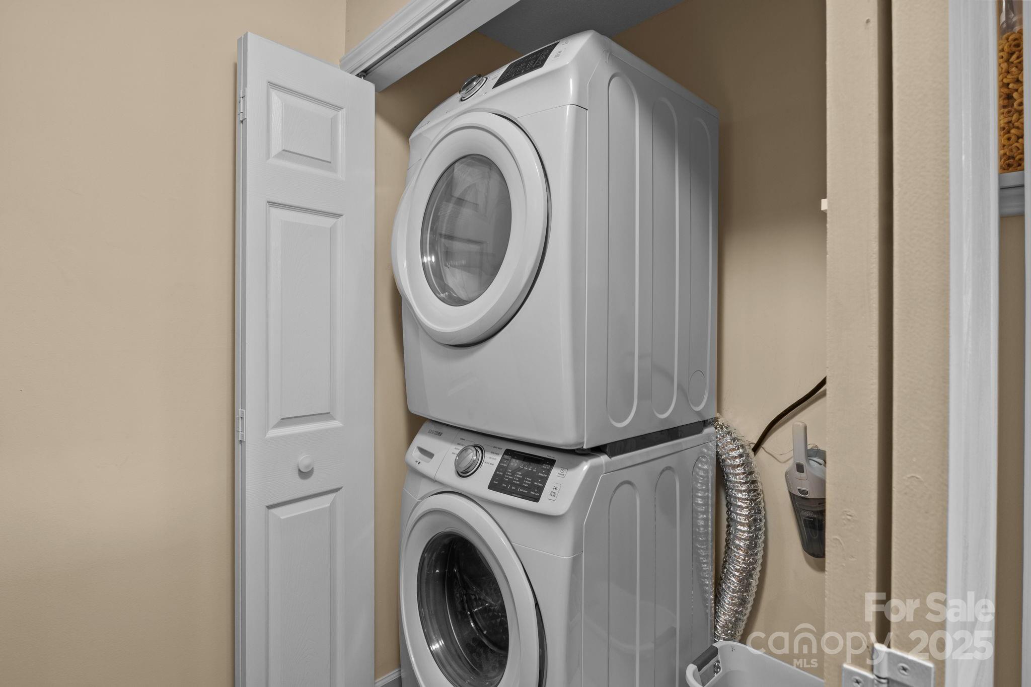 18009 Kings Point Drive, Unit I Cornelius, NC 28031 - Photo 12 of 47 a utility room with dryer and washer