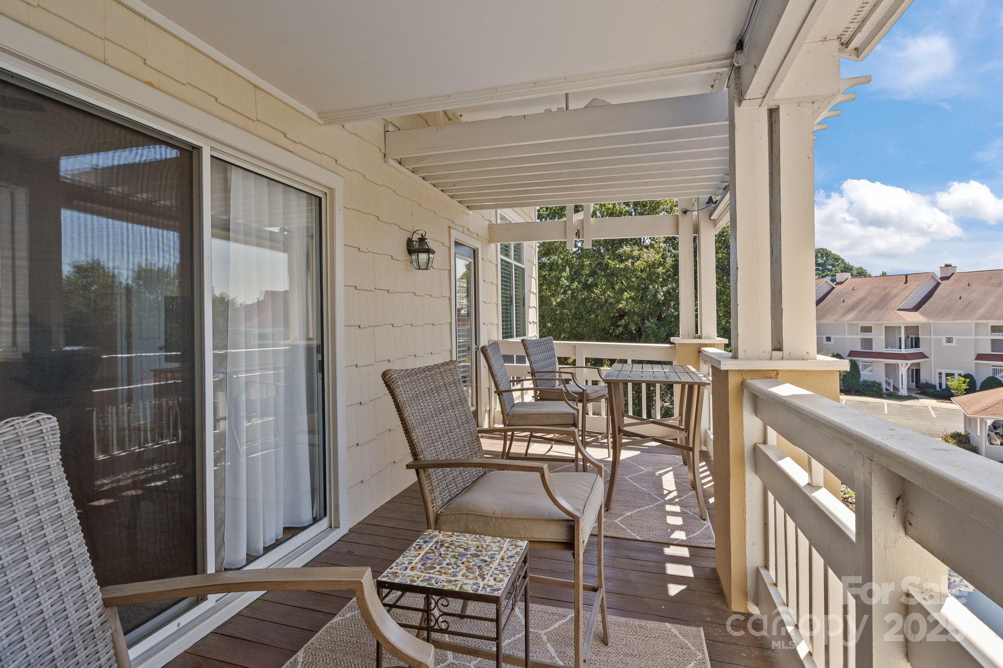 18009 Kings Point Drive, Unit I Cornelius, NC 28031 - Photo 28 of 47 a view of a outdoor seating
