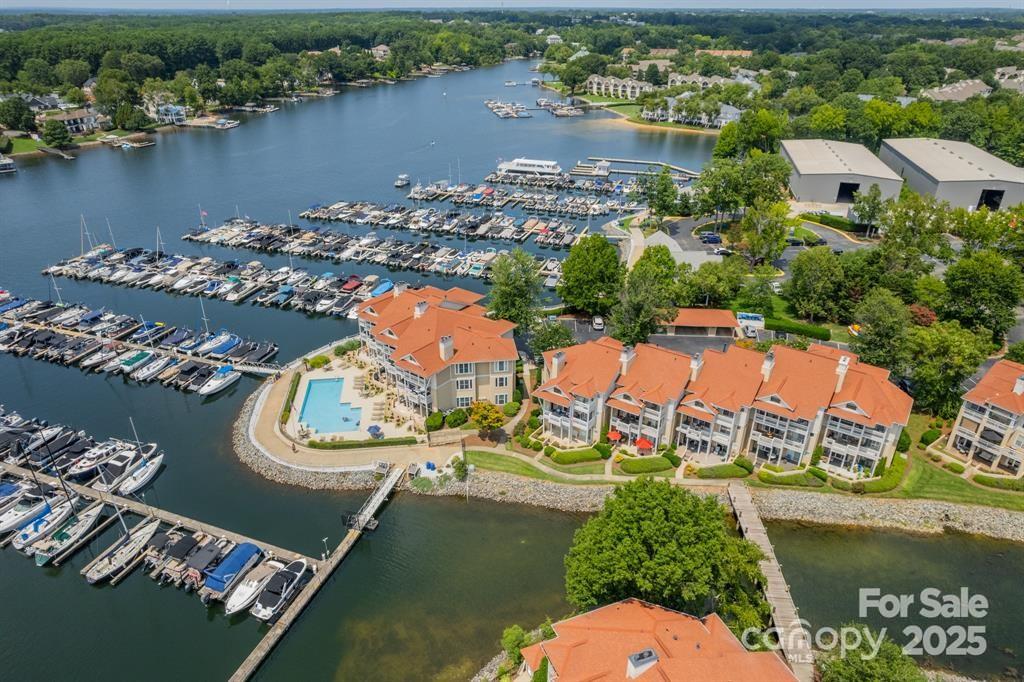 18009 Kings Point Drive, Unit I Cornelius, NC 28031 - Photo 30 of 47 an aerial view of residential houses with outdoor space and lake view