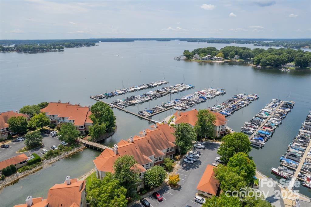 18009 Kings Point Drive, Unit I Cornelius, NC 28031 - Photo 33 of 47 an aerial view of a houses with outdoor space and lake view