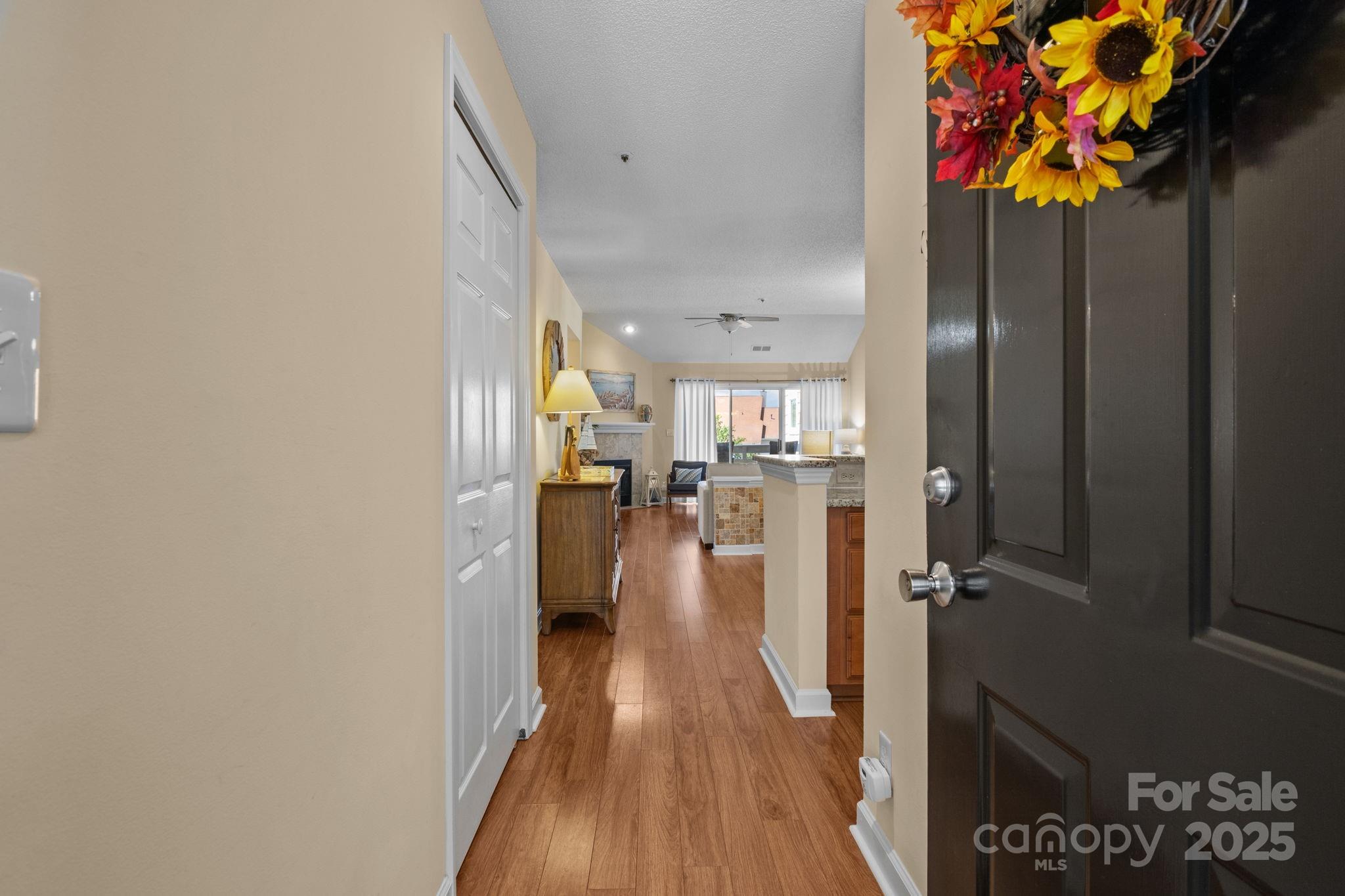 18009 Kings Point Drive, Unit I Cornelius, NC 28031 - Photo 4 of 47 wooden floor in a gallery