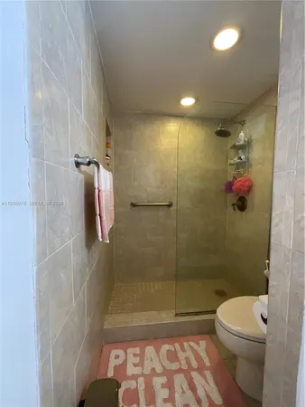 a kitchen with a cabinets and white appliances