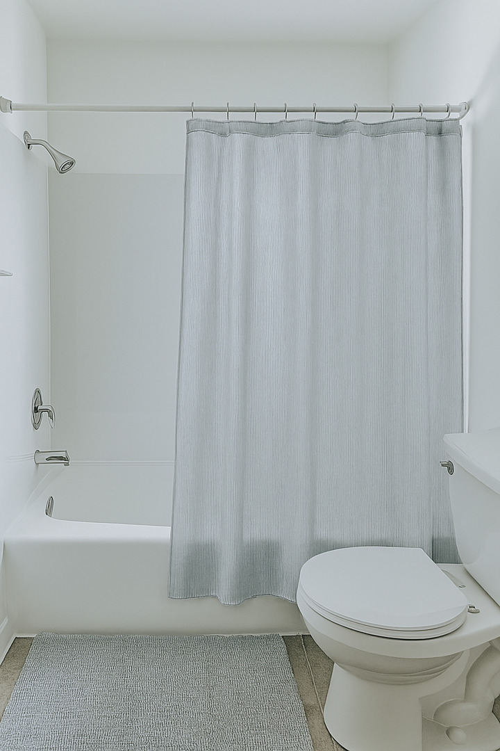 3424 Kimberly Downs Road Davenport, IA 52807 - Photo 8 of 11 a bathroom with a toilet and a bathtub