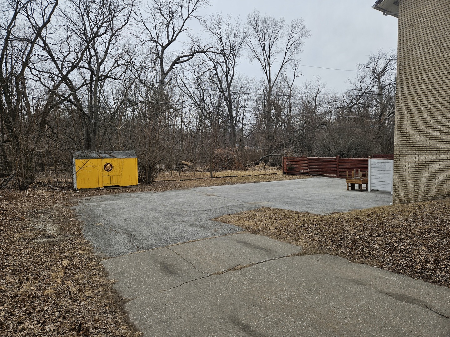 3424 Kimberly Downs Road Davenport, IA 52807 - Photo 10 of 11 a view of outdoor space with trees