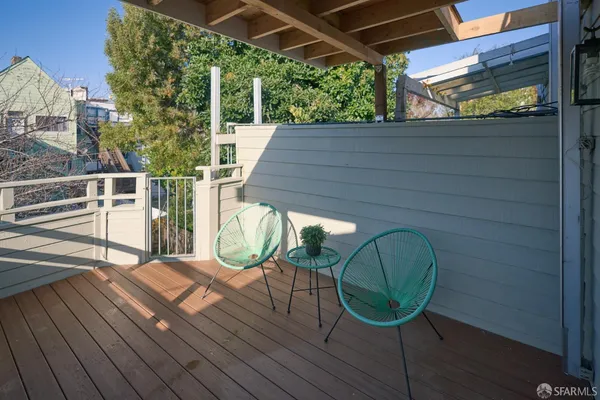 a view of balcony with furniture