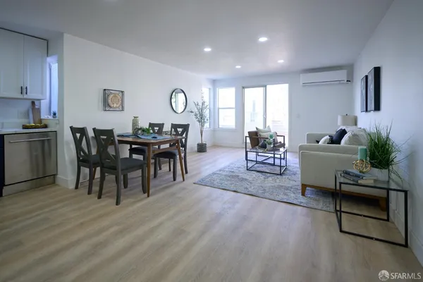 a kitchen with stainless steel appliances granite countertop a refrigerator sink and cabinets