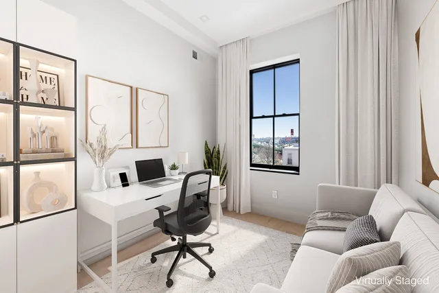 a bathroom with a granite countertop sink a toilet a mirror and shower