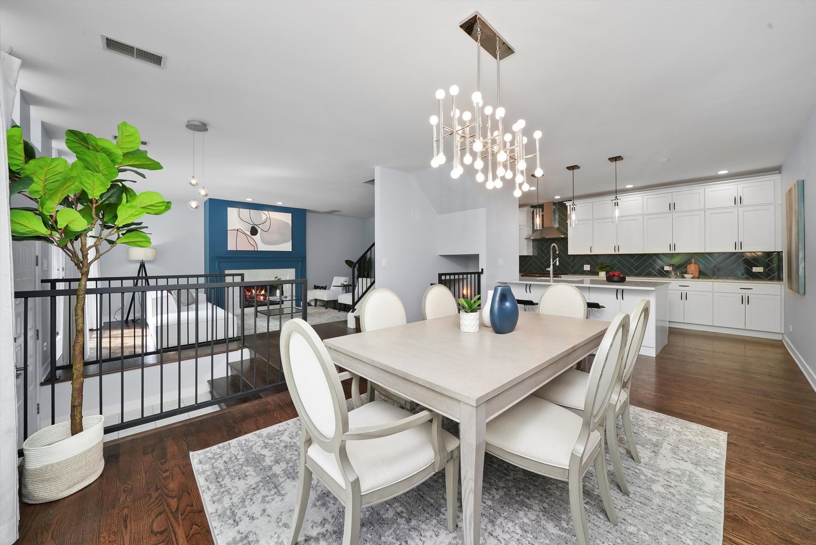 950 North Clark Street, Unit E Chicago, IL 60610 - Photo 11 of 52 a view of a dining room with furniture and wooden floor