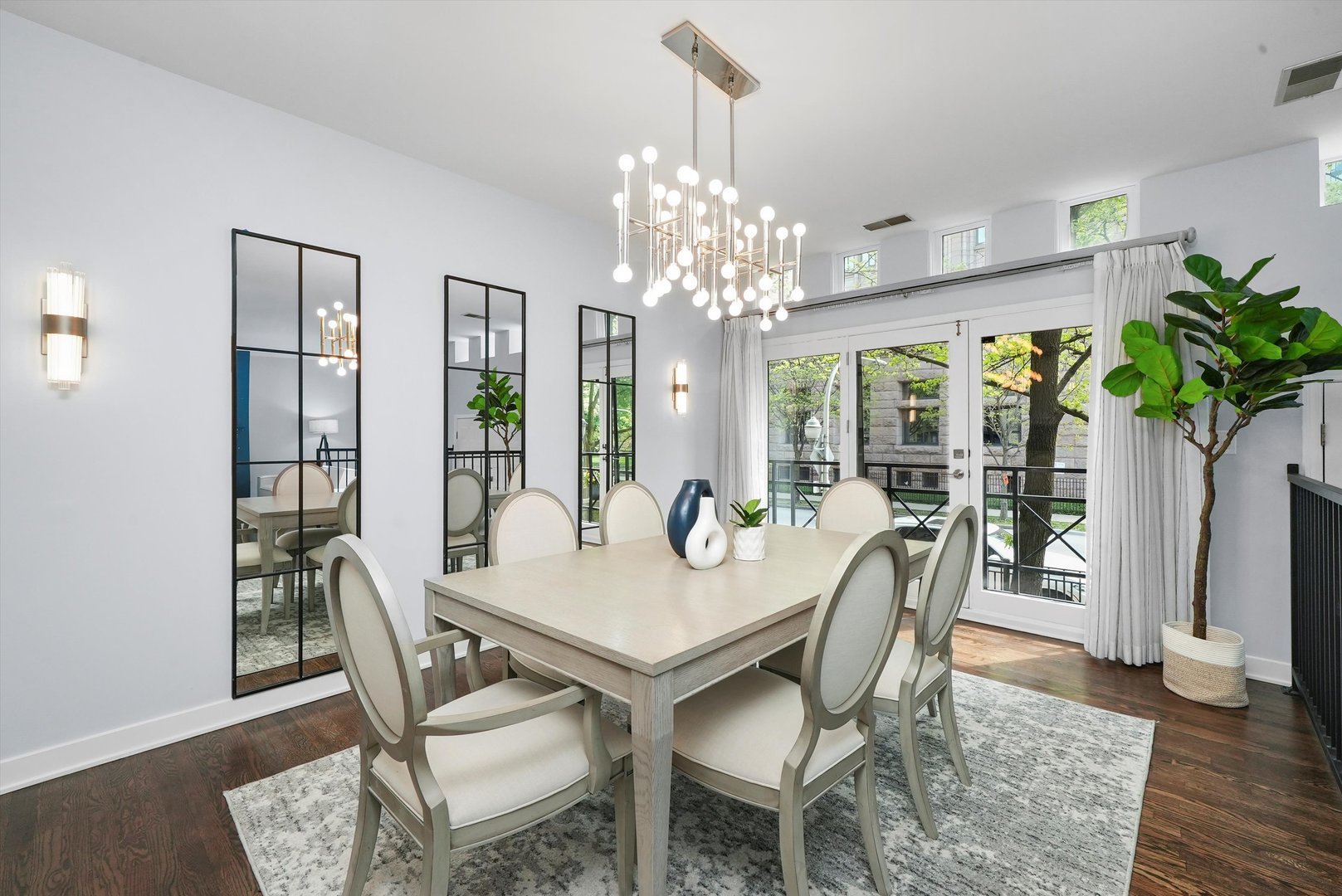 950 North Clark Street, Unit E Chicago, IL 60610 - Photo 12 of 52 a view of a dining room with furniture window and wooden floor