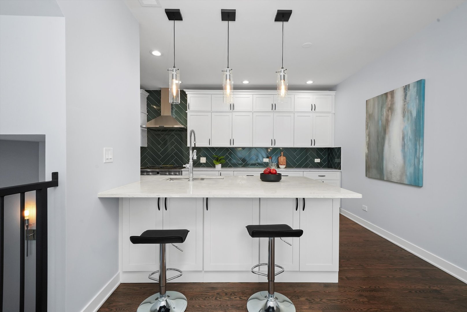 950 North Clark Street, Unit E Chicago, IL 60610 - Photo 18 of 52 a kitchen with cabinets and chairs
