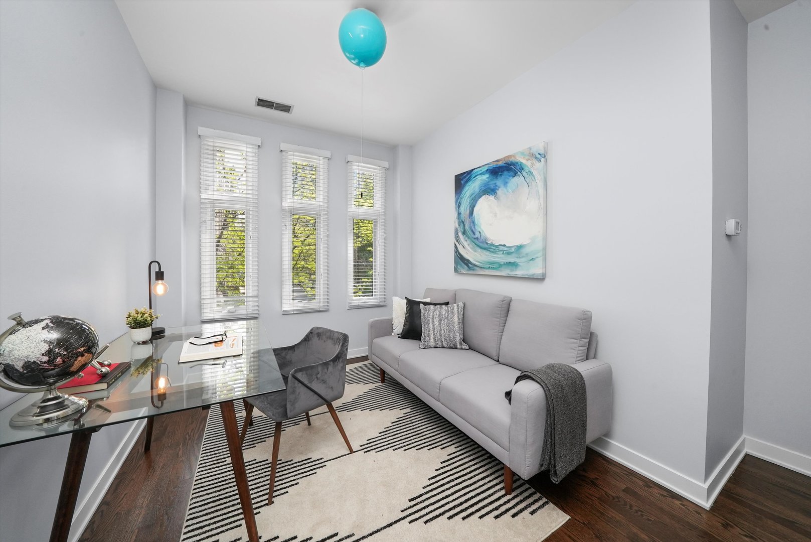 950 North Clark Street, Unit E Chicago, IL 60610 - Photo 26 of 52 a living room with furniture and a window