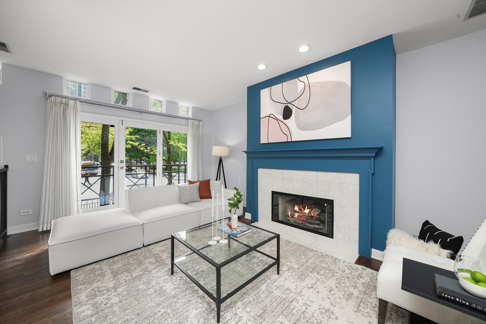 950 North Clark Street, Unit E Chicago, IL 60610 - Photo 4 of 52 a living room with furniture a fireplace and a large window