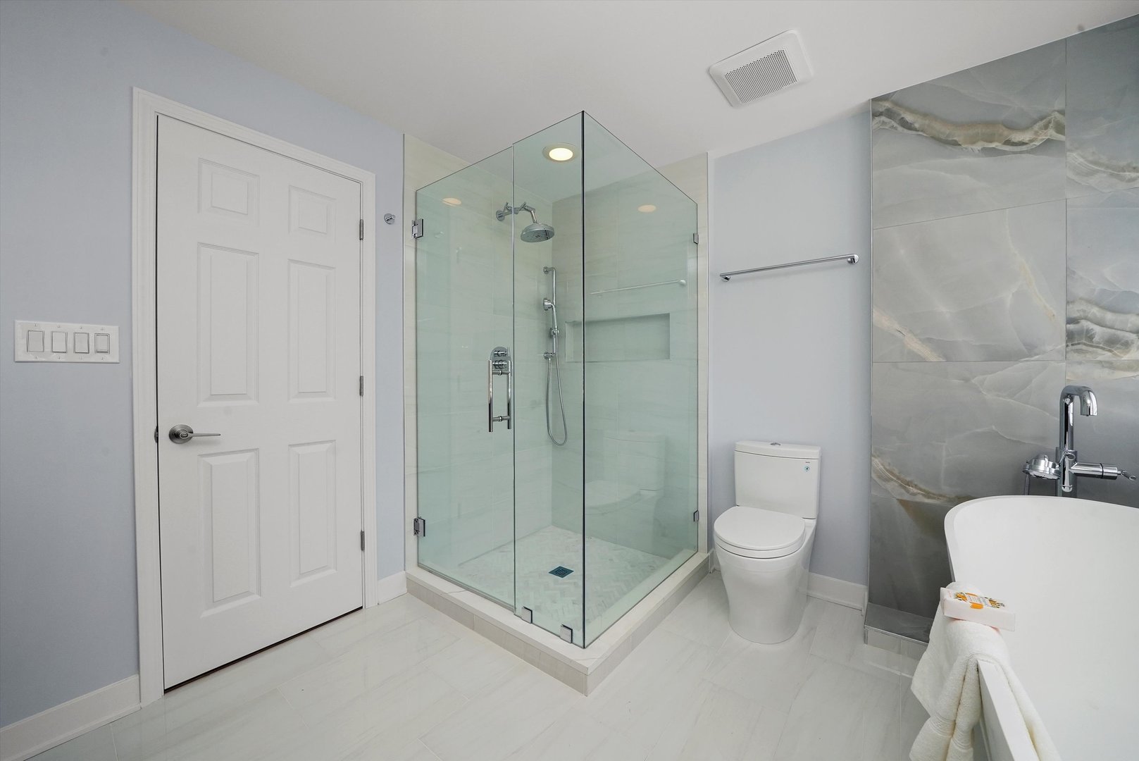 950 North Clark Street, Unit E Chicago, IL 60610 - Photo 46 of 52 a bathroom with a shower toilet and sink