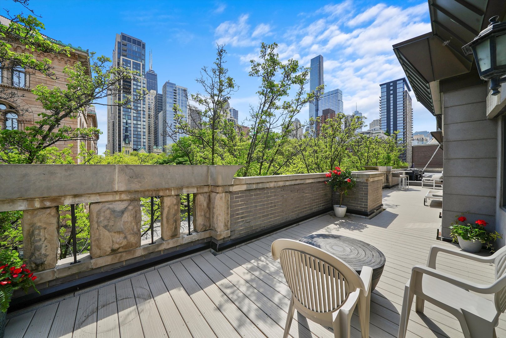950 North Clark Street, Unit E Chicago, IL 60610 - Photo 47 of 52 a view of a chairs and table on the balcony