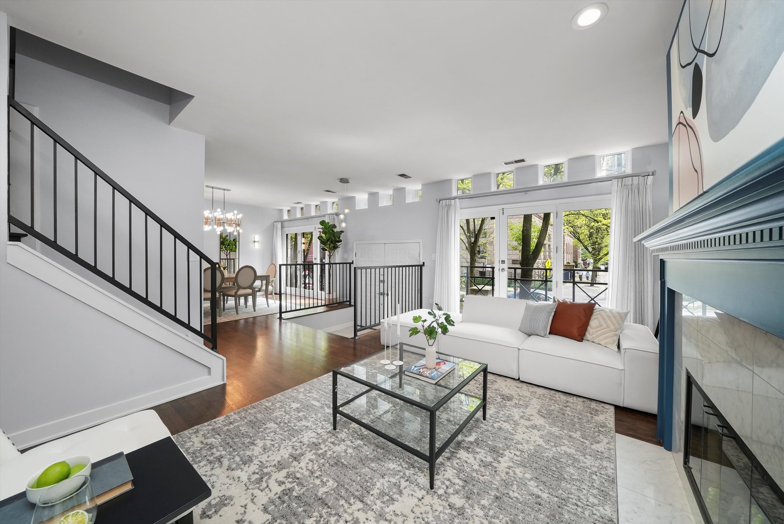 950 North Clark Street, Unit E Chicago, IL 60610 - Photo 6 of 52 a living room with fireplace furniture and a dining table