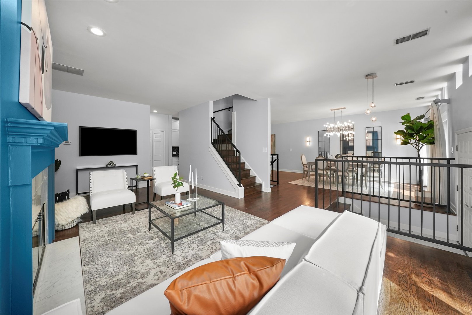 950 North Clark Street, Unit E Chicago, IL 60610 - Photo 10 of 52 a living room with furniture and a flat screen tv