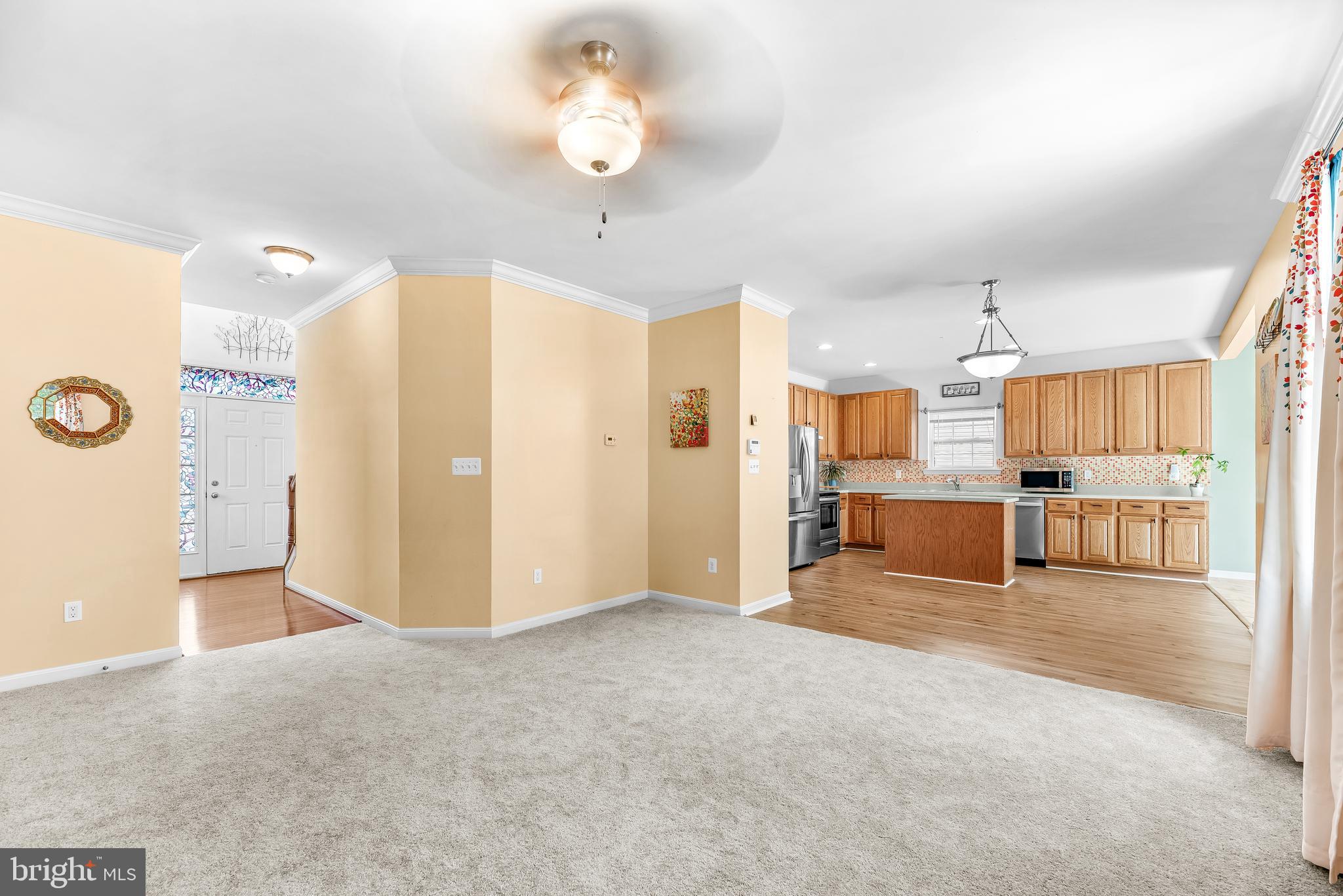 252 Rimfire Way Prince Frederick, MD 20678 - Photo 11 of 35 a view of a kitchen with a sink and cabinet area