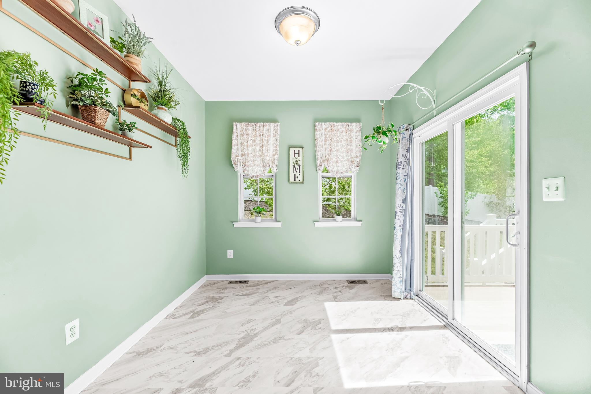 252 Rimfire Way Prince Frederick, MD 20678 - Photo 19 of 35 a bedroom with a bed and a window