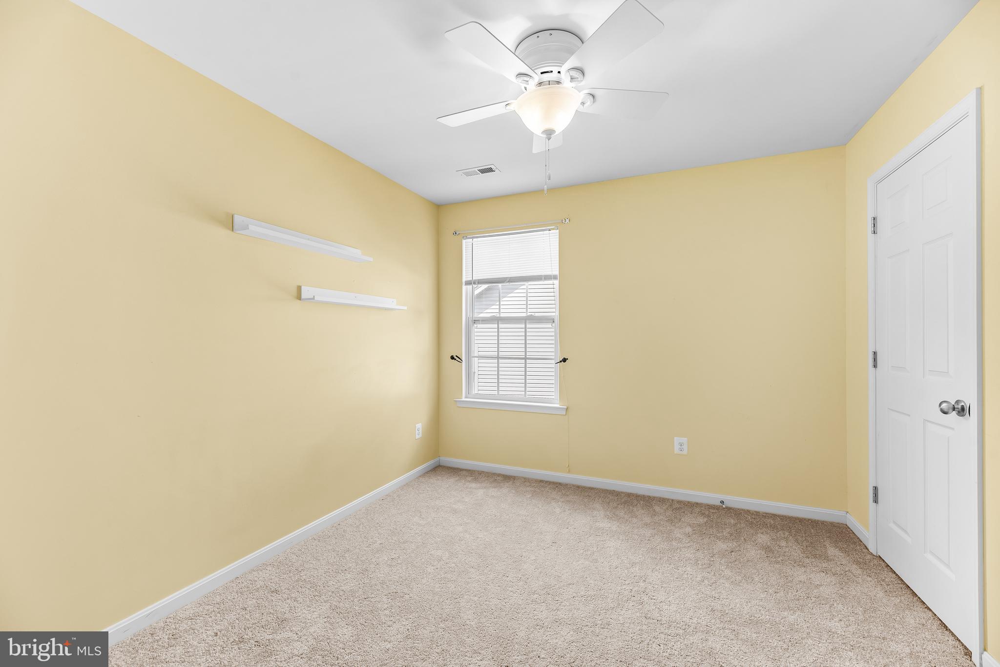 252 Rimfire Way Prince Frederick, MD 20678 - Photo 23 of 35 a view of room with window and ceiling fan