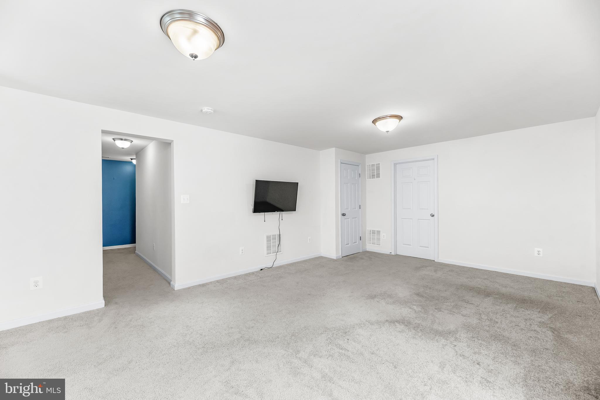 252 Rimfire Way Prince Frederick, MD 20678 - Photo 30 of 35 an empty room with windows