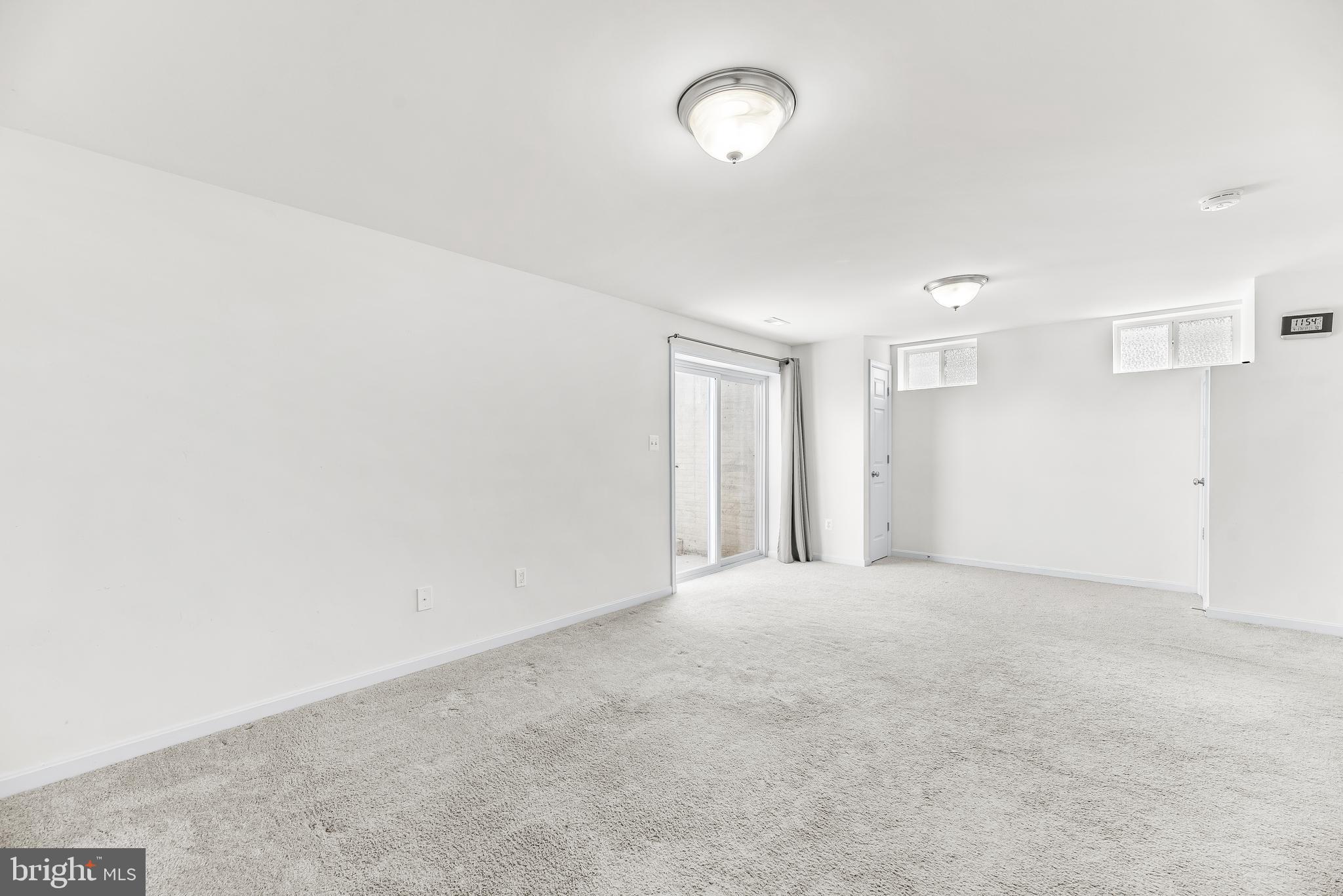 252 Rimfire Way Prince Frederick, MD 20678 - Photo 31 of 35 a view of an empty room with a window
