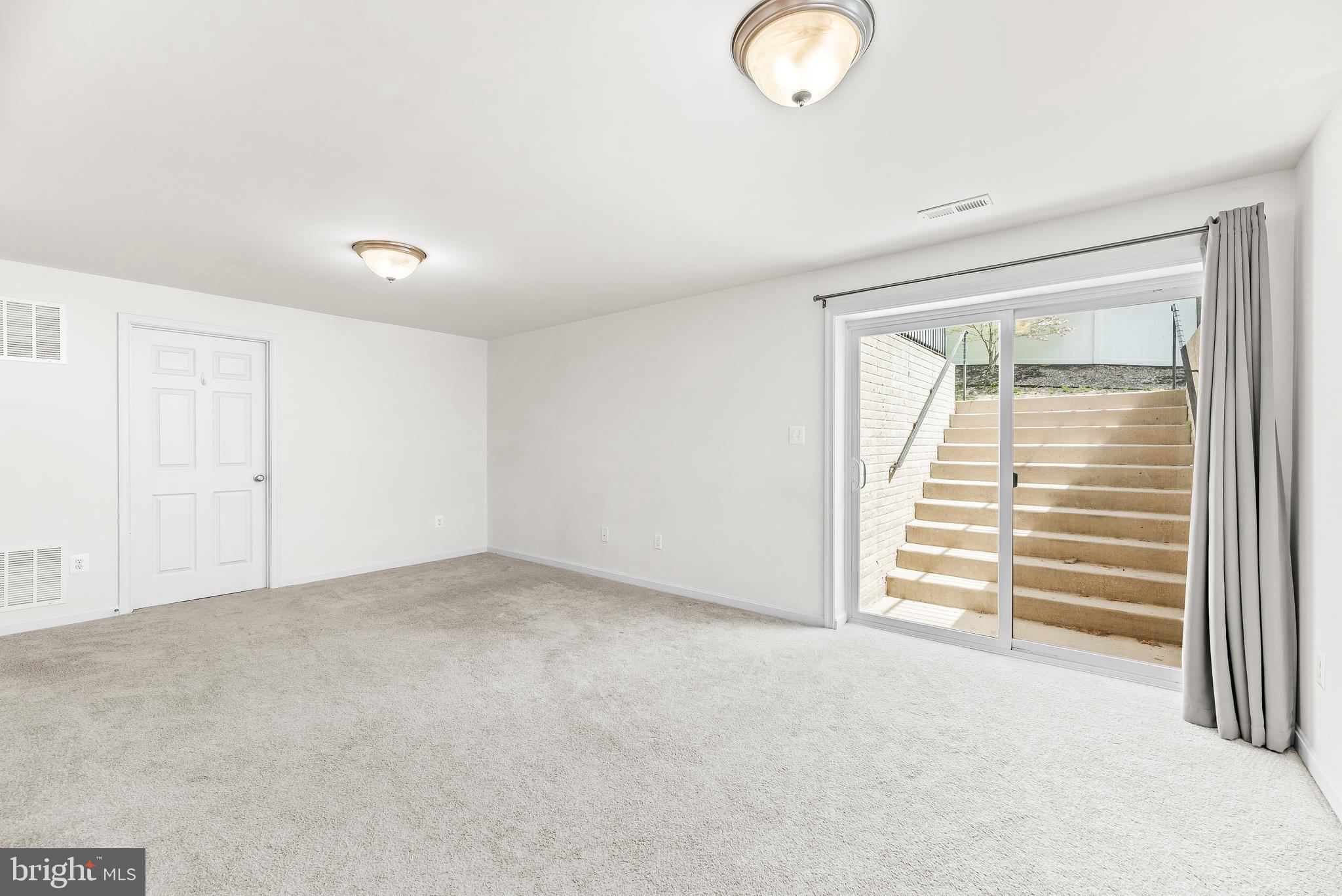 252 Rimfire Way Prince Frederick, MD 20678 - Photo 33 of 35 an empty room with windows