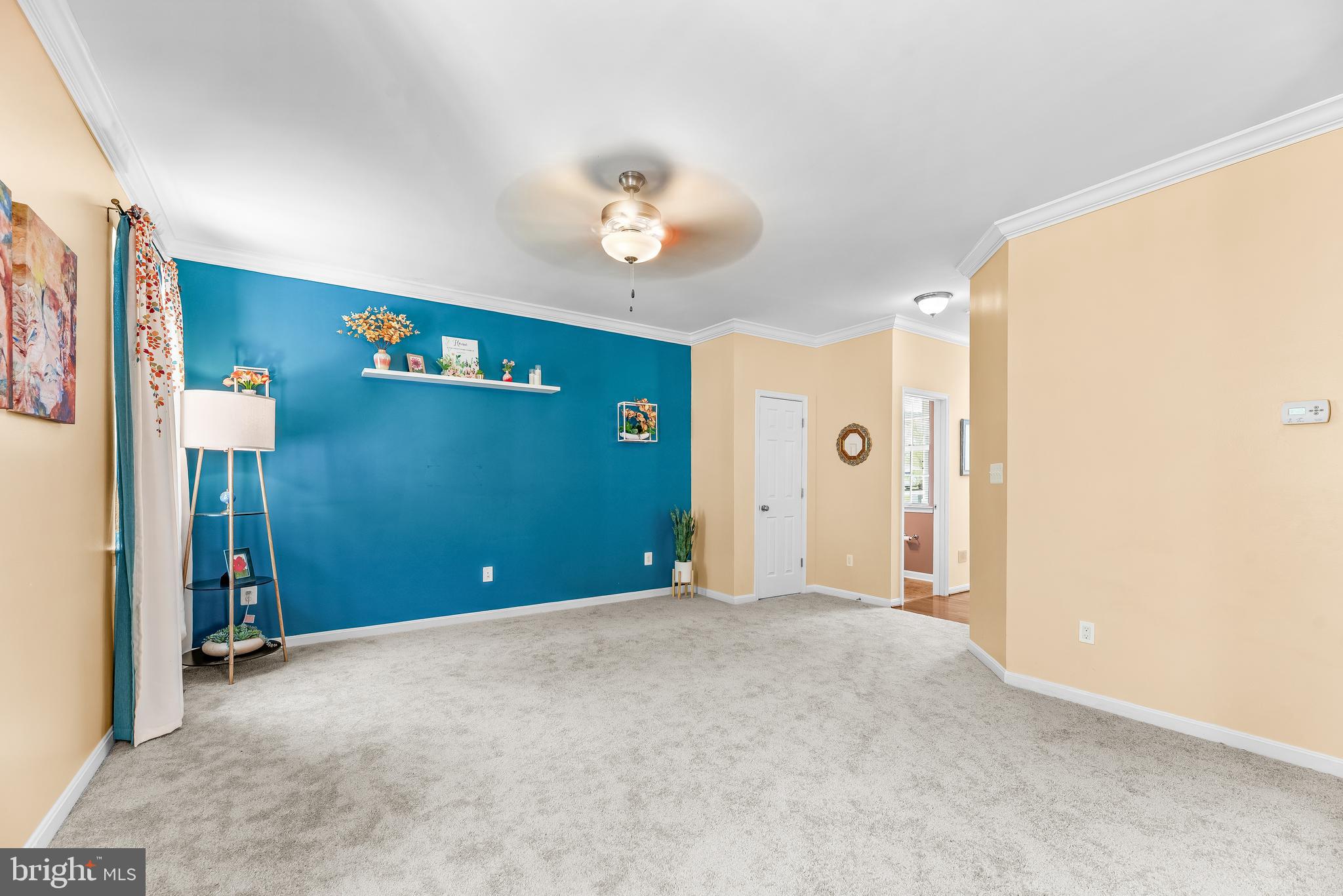 252 Rimfire Way Prince Frederick, MD 20678 - Photo 8 of 35 a view of a livingroom with a chandelier fan