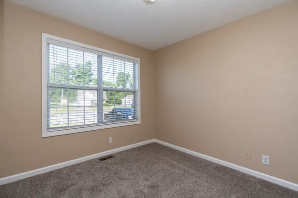 a view of a room with a window
