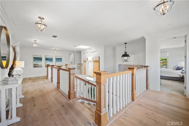 a view of a livingroom with furniture and hardwood floor