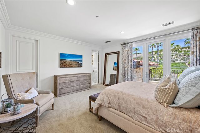 a bedroom with a bed and furniture