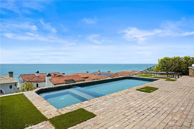a view of a chairs and table in the terrace