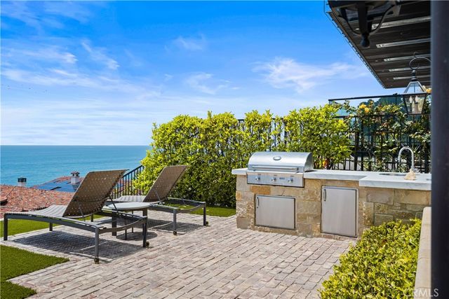 a aerial view of a house with swimming pool