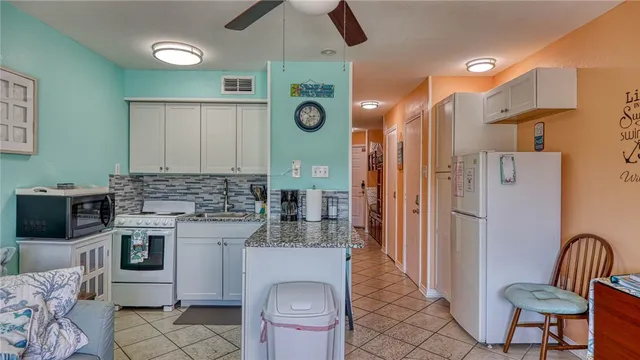 a view of roof deck with sitting area