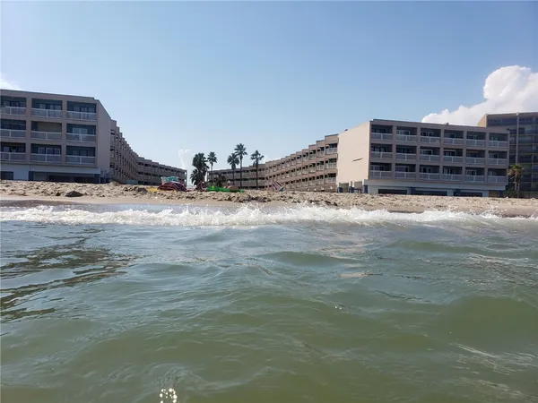 a view of a building with a street