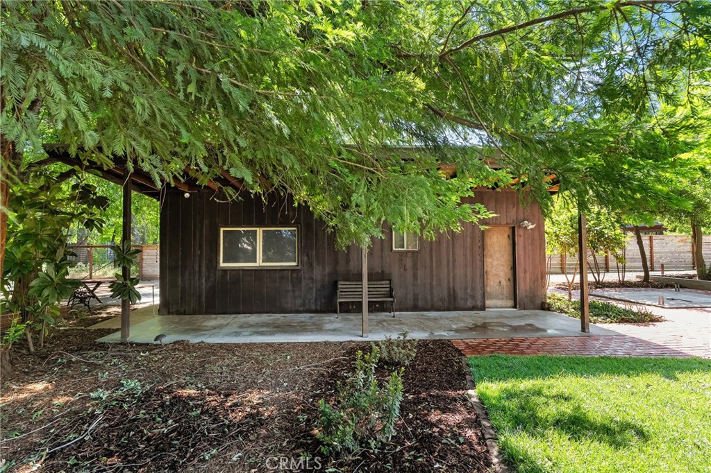 897 Filbert Avenue Chico, CA 95926 - Photo 58 of 66 a house with trees in front of it