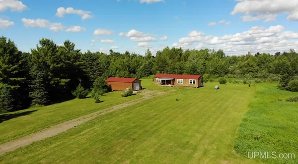 $229,000 | 4990 Ffh 16 Highway, Trout Creek, MI 49967