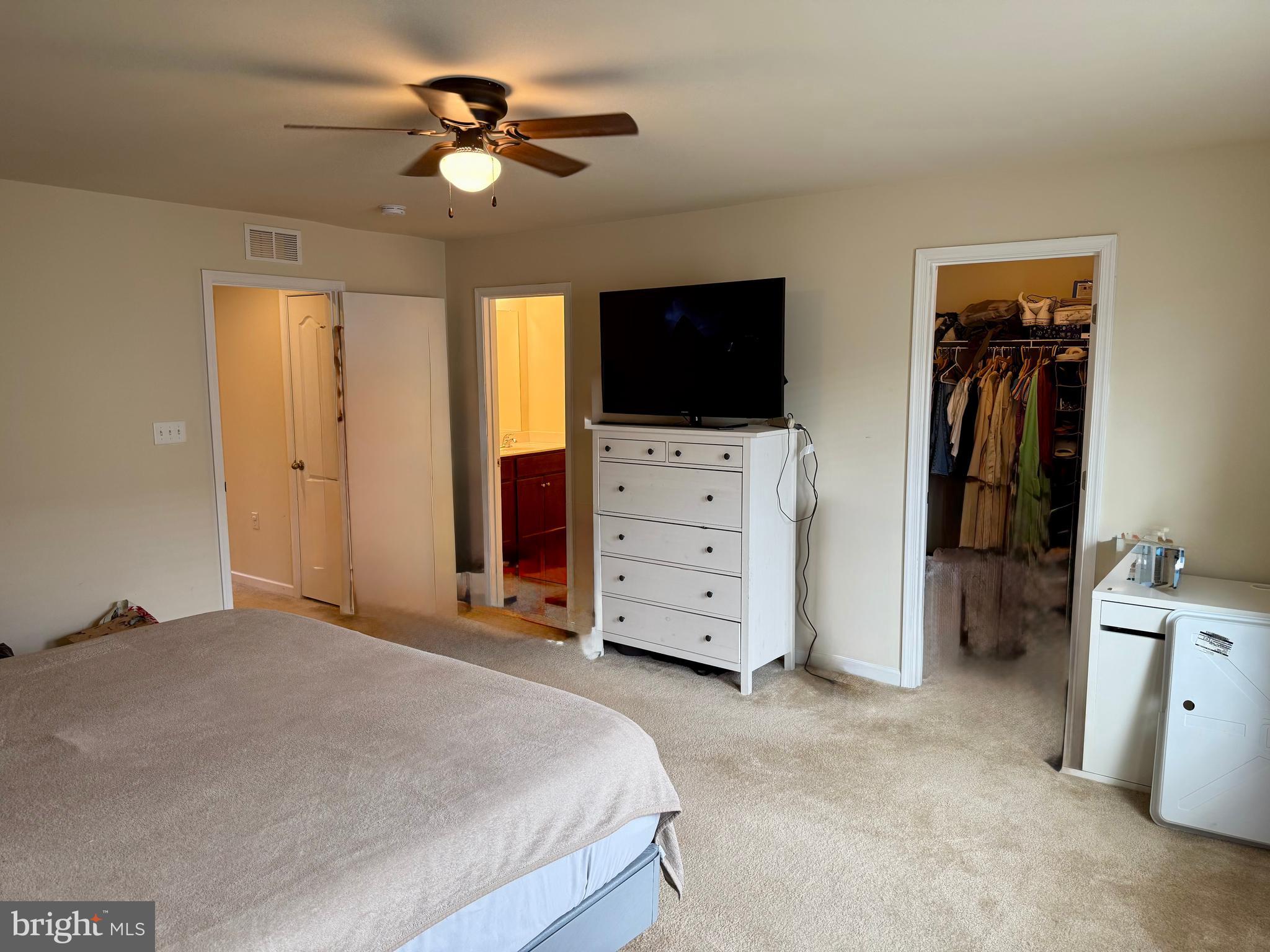 236 Schramm Loop Stephens City, VA 22655 - Photo 17 of 26 a bedroom with a bed and a television