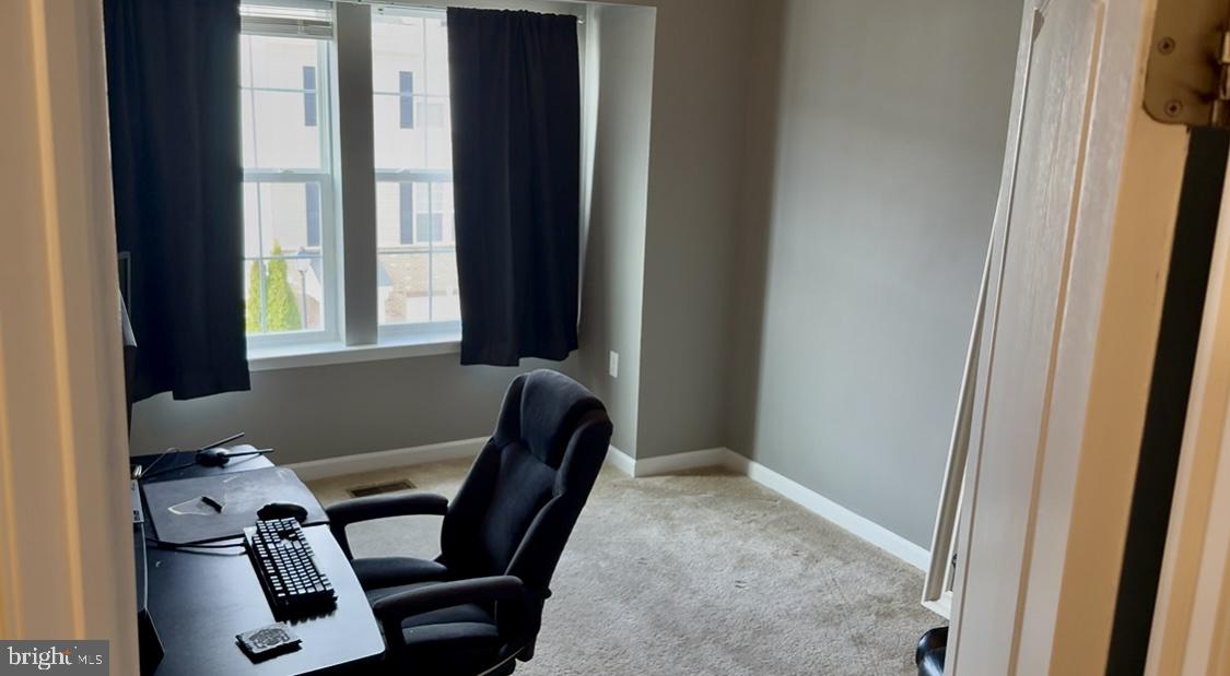 236 Schramm Loop Stephens City, VA 22655 - Photo 23 of 26 a view of a workspace with furniture and a window