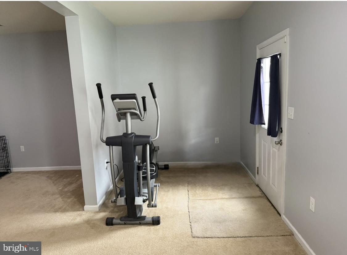 236 Schramm Loop Stephens City, VA 22655 - Photo 5 of 26 a view of a room with gym equipment