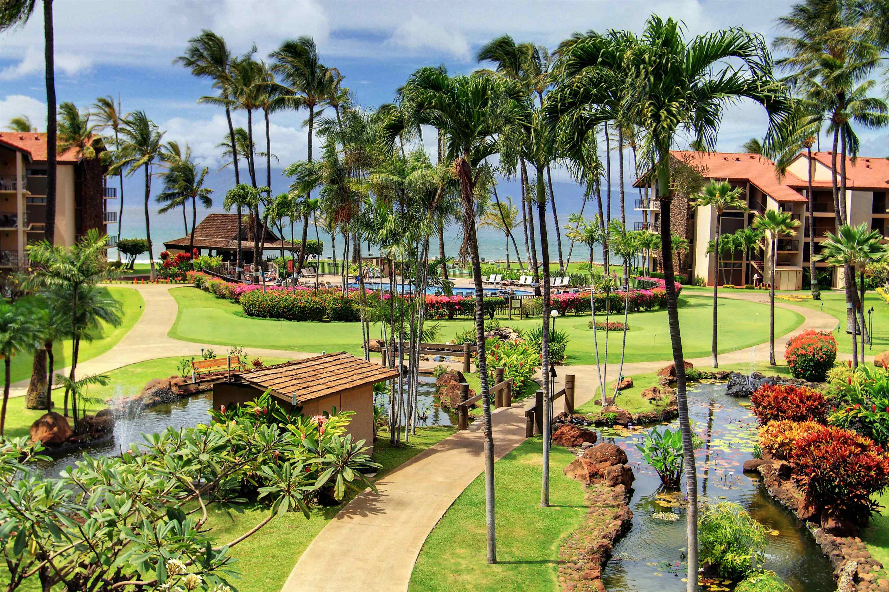 3543 Lower Honoapiilani Road, Unit K403 Lahaina, HI 96761 - Photo 14 of 29 a view of a park with plants and palm trees