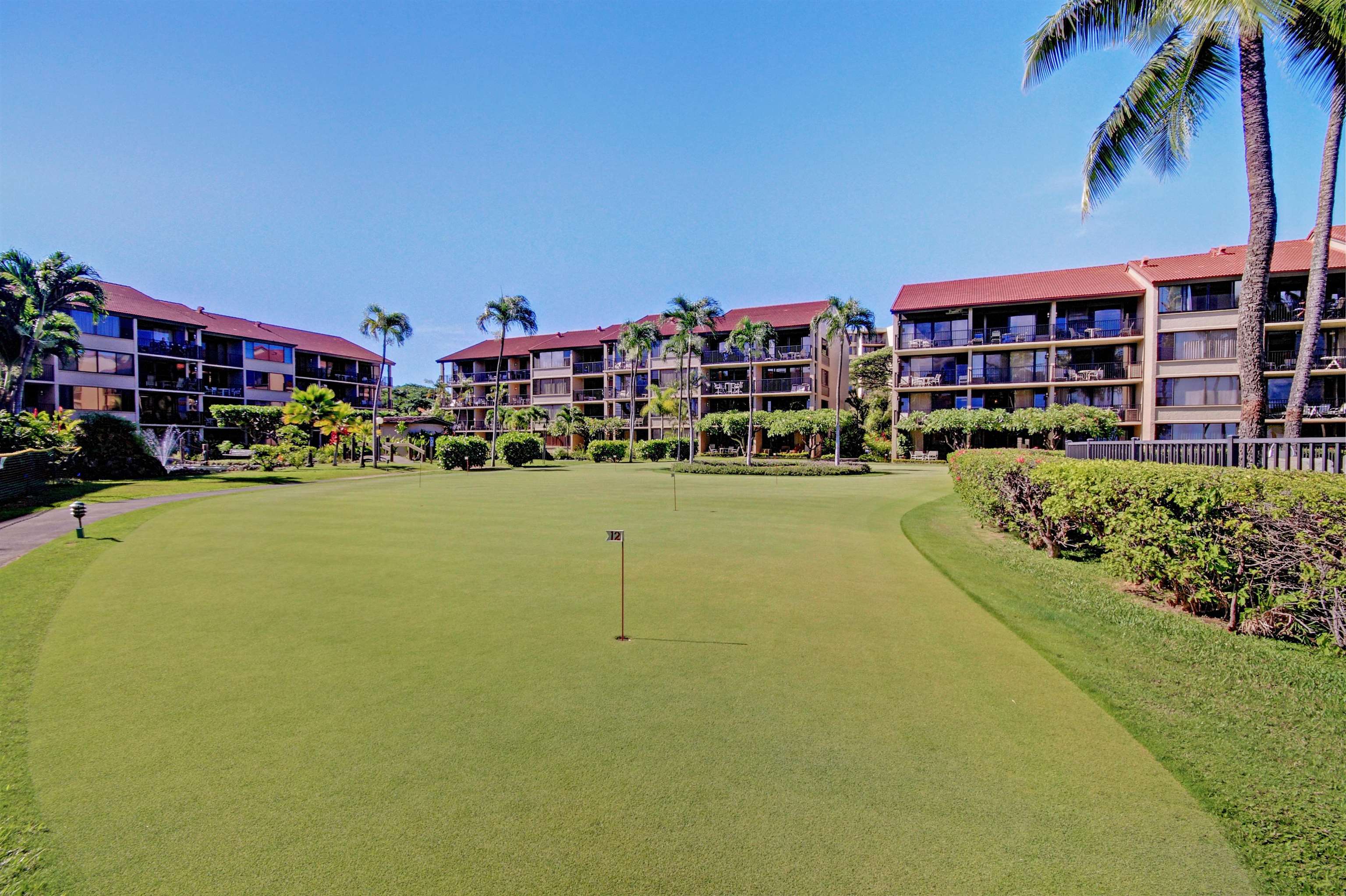 3543 Lower Honoapiilani Road, Unit K403 Lahaina, HI 96761 - Photo 18 of 29 a building view with a swimming pool