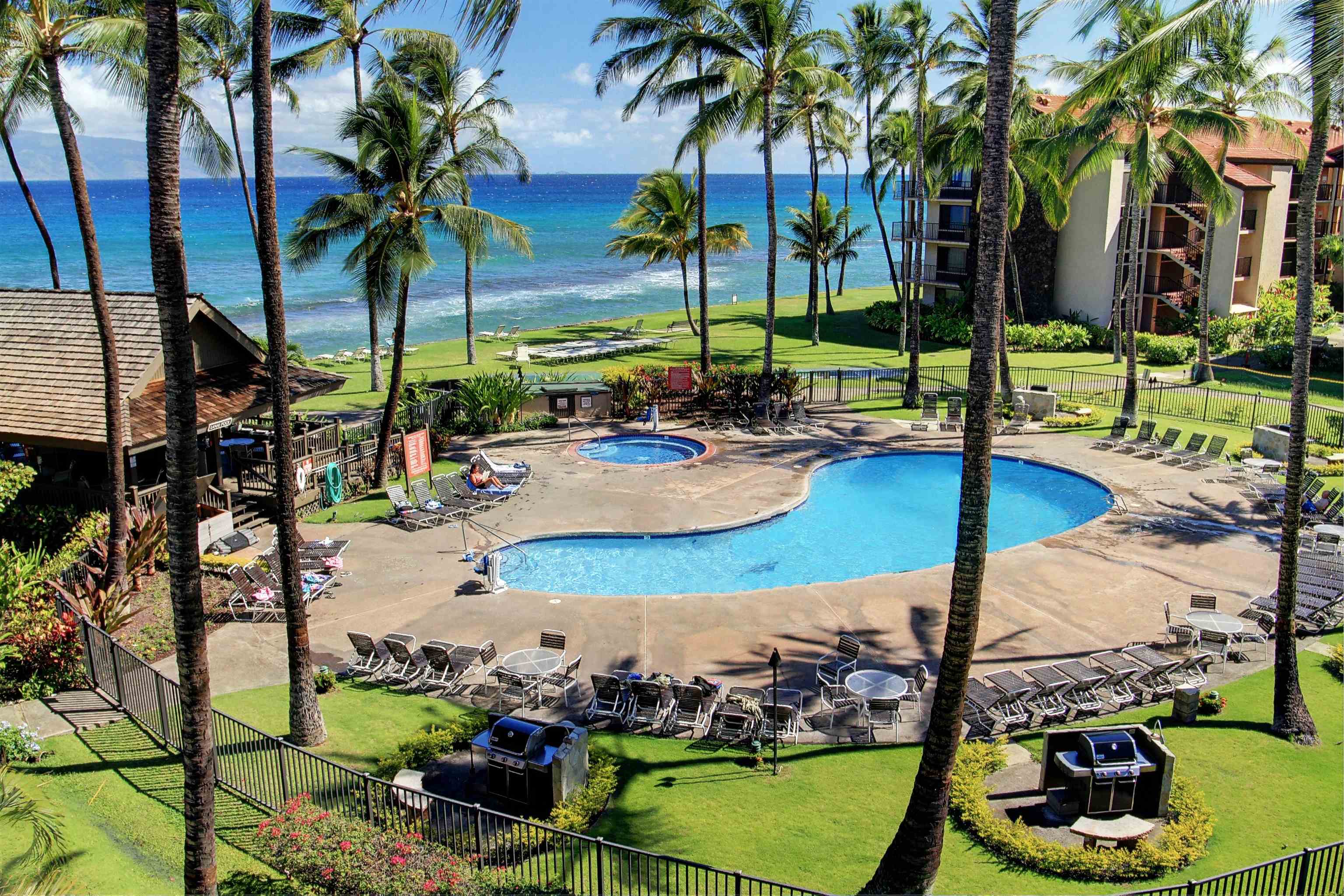 3543 Lower Honoapiilani Road, Unit K403 Lahaina, HI 96761 - Photo 8 of 29 a view of outdoor space with seating area and swimming pool