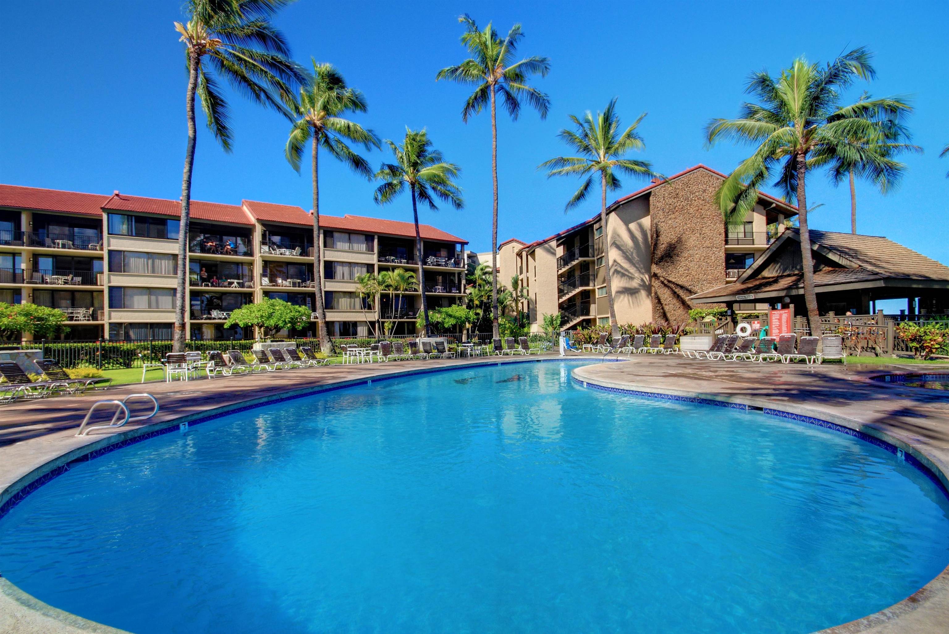 3543 Lower Honoapiilani Road, Unit K403 Lahaina, HI 96761 - Photo 9 of 29 a view of swimming pool with outdoor seating and deck