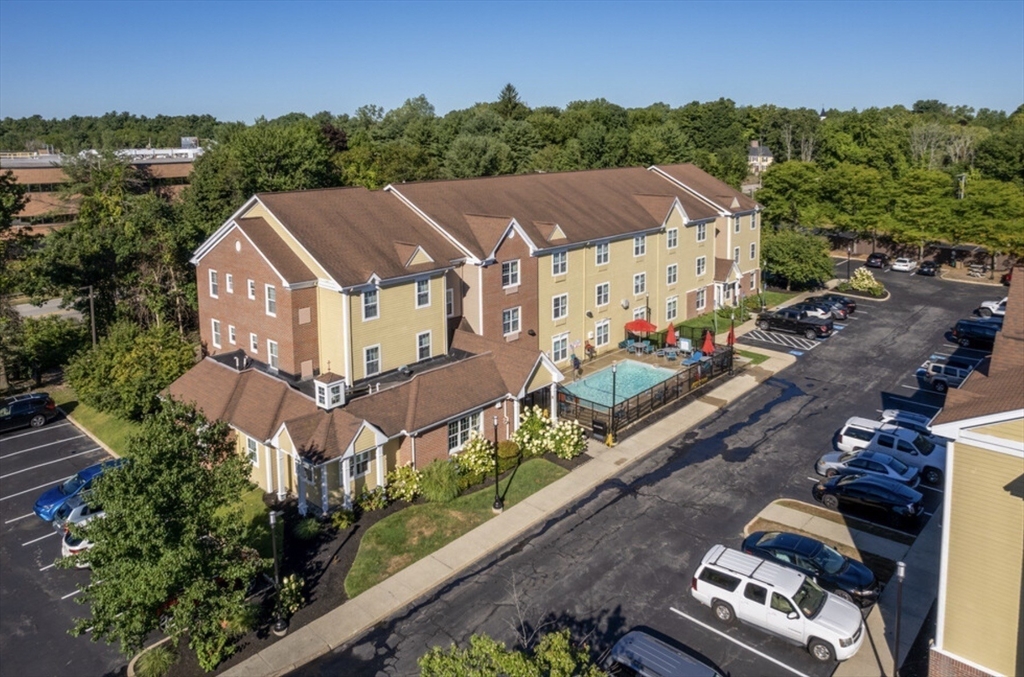 20 International Place, Unit 310 Tewksbury, MA 01876 - Photo 21 of 27 an aerial view of a house