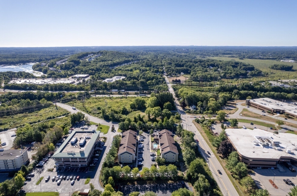 20 International Place, Unit 310 Tewksbury, MA 01876 - Photo 23 of 27 an aerial view of a city and lake view